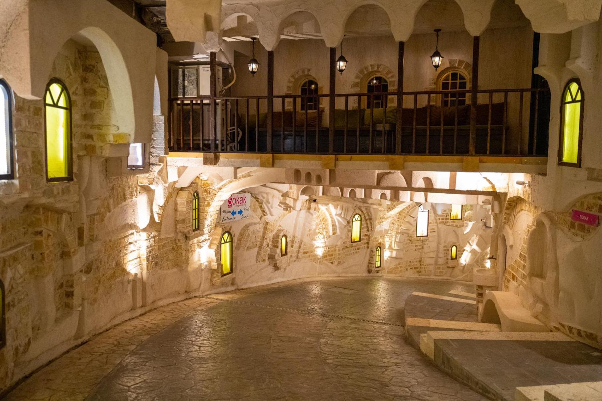 Bougainville Bay Hotel Sarandë Esterno foto The cave monastery