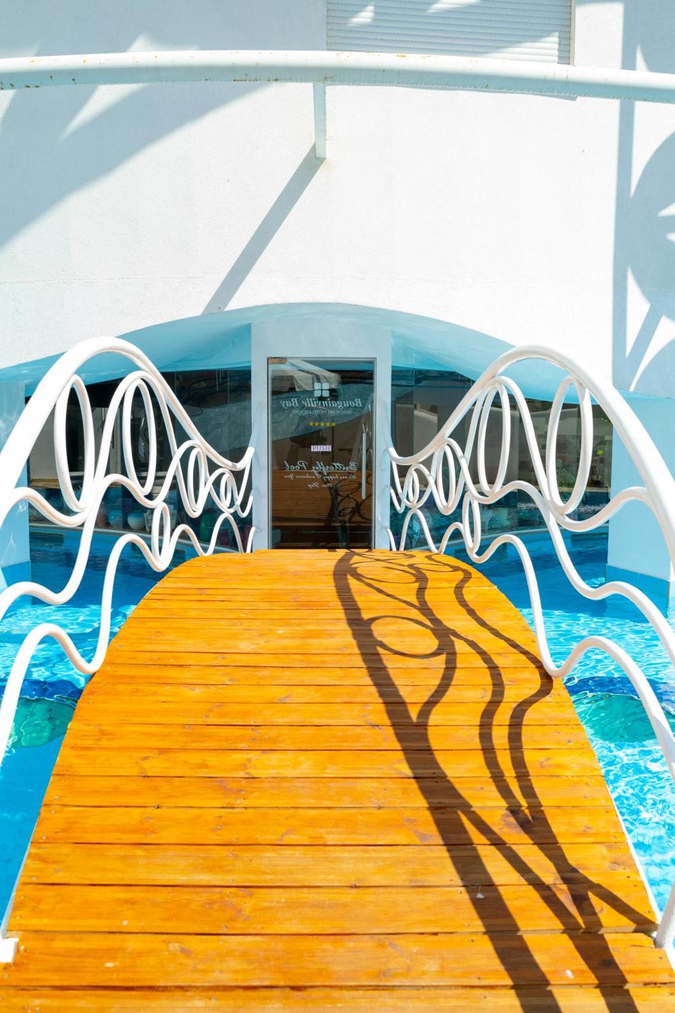 Bougainville Bay Hotel Sarandë Esterno foto The entrance to the pool